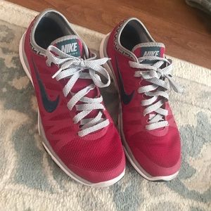 Burgundy Nike running shoe